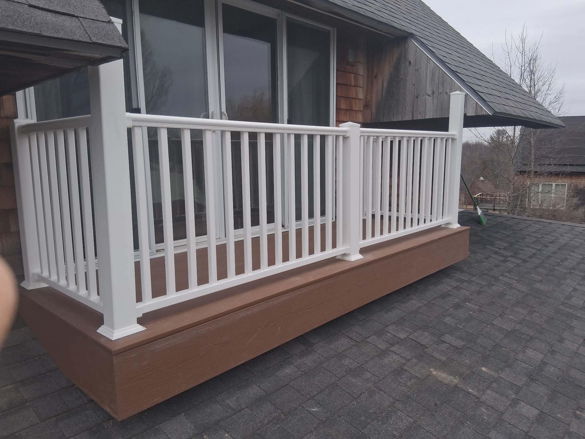 Completed rooftop deck — railing detail close-up