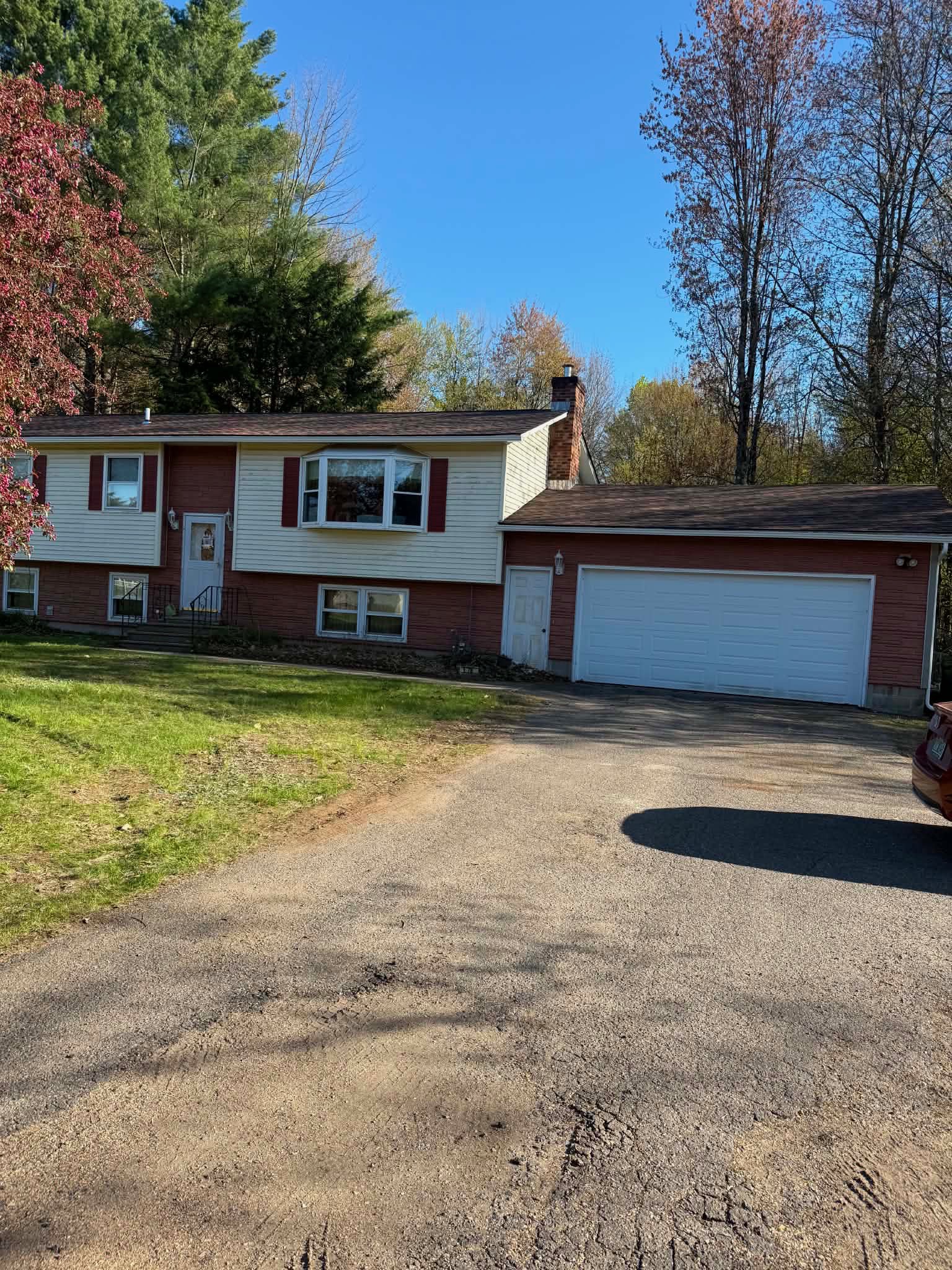 Completed architectural shingle roof — full house view